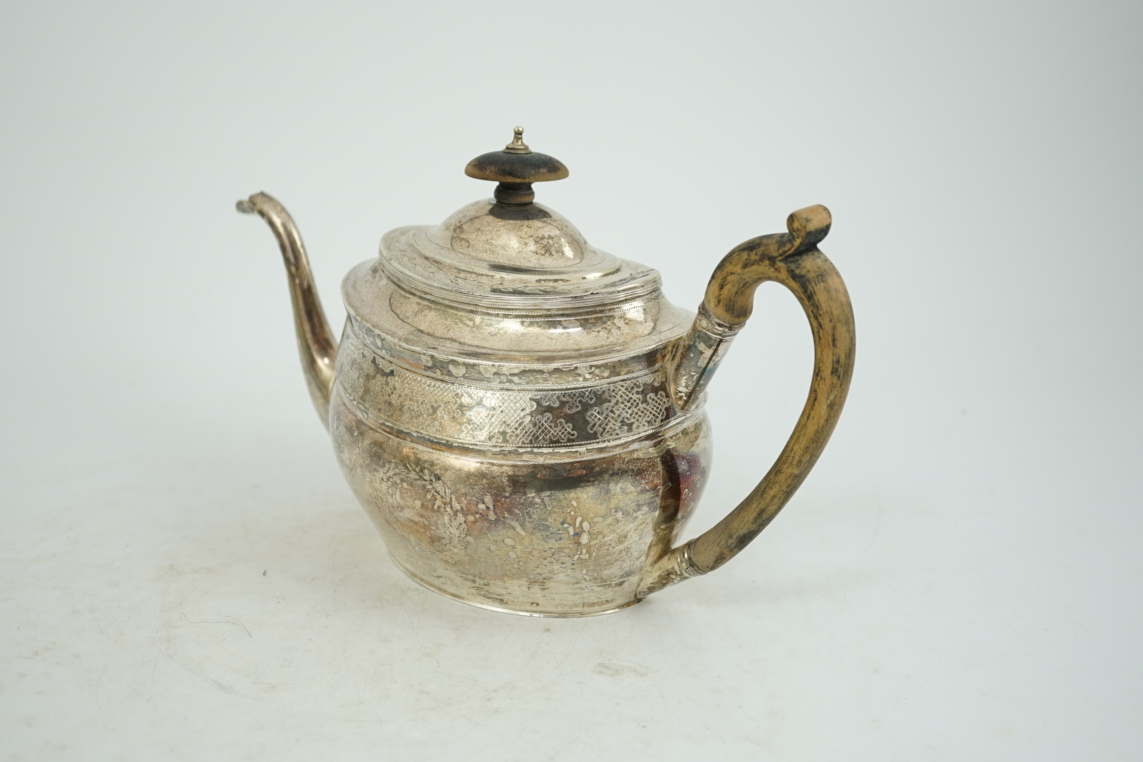 A George III engraved silver oval teapot, Alice & George Burrows, London, 1803, gross weight 13.2oz.